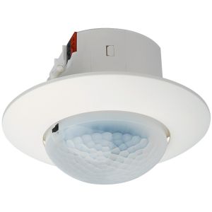 A ceiling mounted motion detector with a white rim.