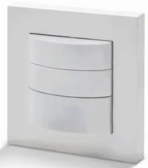 A white wall mounted light switch with three drawers.